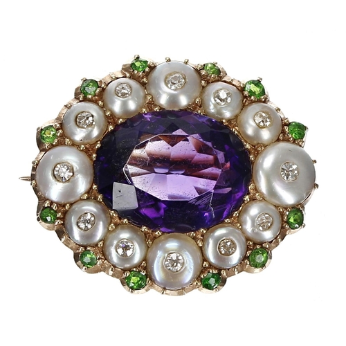 338 - Attractive 'Suffragette' oval gold brooch, set with an oval amethyst in a border of pearls each set ... 