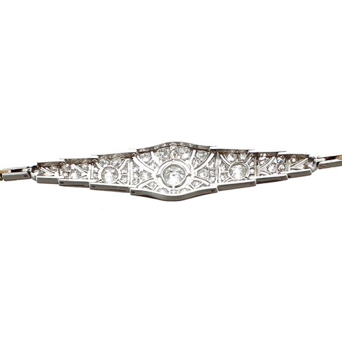 344 - Attractive Art Deco platinum and gold diamond bracelet, set with round old-cut diamonds in a stylise... 