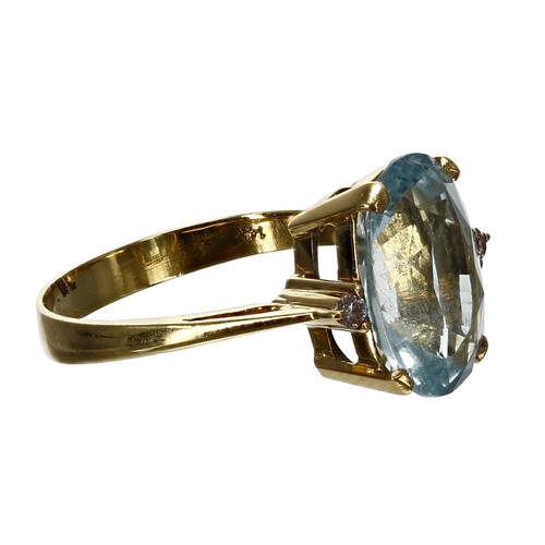 329 - Modern 14ct aquamarine and diamond three stone ring, the oval aquamarine 3.60ct approx, width 12mm, ... 