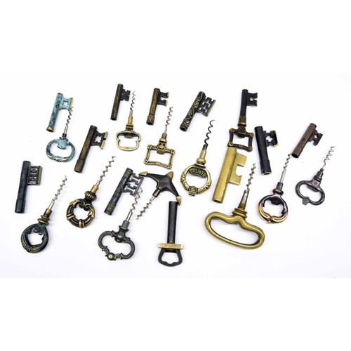 550 - Group of eleven assorted novelty metal key corkscrews; together with three split frame corkscrews wi... 