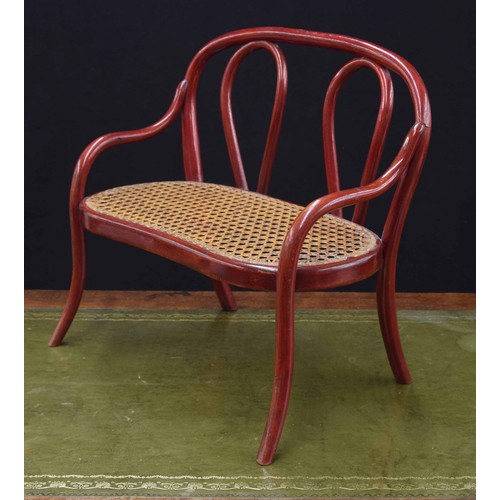 562 - Thonet workshop bentwood and cane seat dolls settee, 14.5