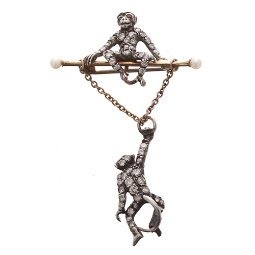 340 - Good novelty diamond set swinging monkey brooch, the gold bar with pearls set to each end, perched w... 