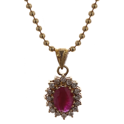 383 - 18ct yellow gold ruby and diamond oval cluster pendant, on a slender bead necklace, the pendant 17mm... 