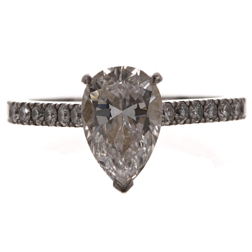 389 - Fine De Beers pear shaped platinum solitaire diamond ring with diamond pavé shoulders, the pear diam... 