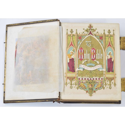 568 - Browns Self-Interpreting Family Bible, with coloured plates, bound in a tooled leather cover having ... 