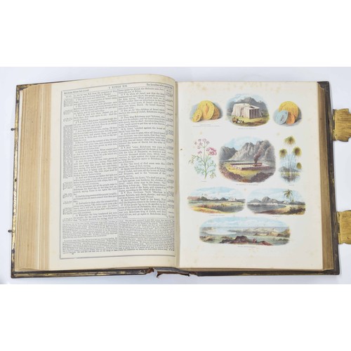 568 - Browns Self-Interpreting Family Bible, with coloured plates, bound in a tooled leather cover having ... 