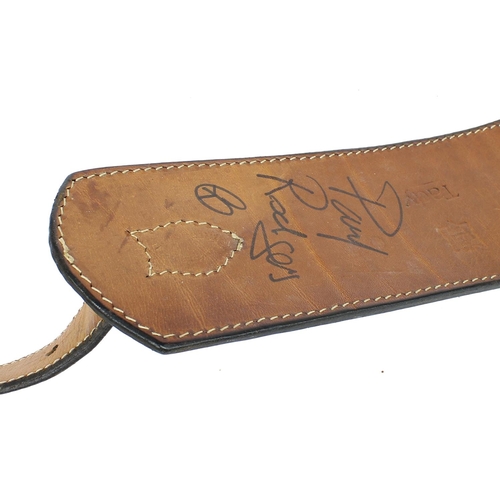 568 - Paul Rodgers - personal Tardy tooled leather guitar strap, bearing Paul Rodgers' name amongst floral... 