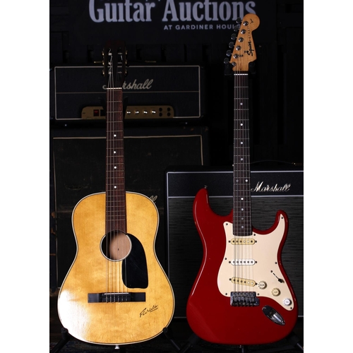 631 - 1996 Squier by Fender Strat electric guitar, red finish, gig bag (imperfections); together with a Fl... 