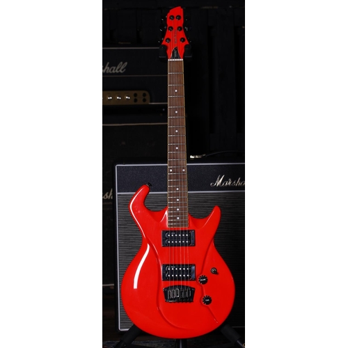 655 - Switch Vibracell Wild II electric guitar; Body: neon orange finish; Neck: good; Fretboard: rosewood;... 