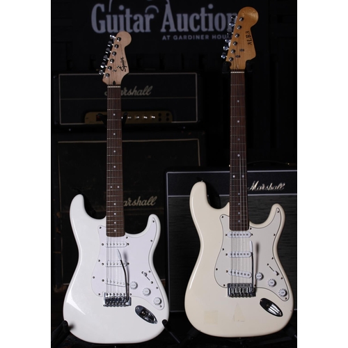 684 - 2021 Squier by Fender Stratocaster electric guitar, made in Indonesia; together with an Alba S Type ... 