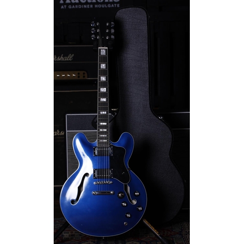 702 - 335 Type hollow body electric guitar, metallic blue finish, with hard case