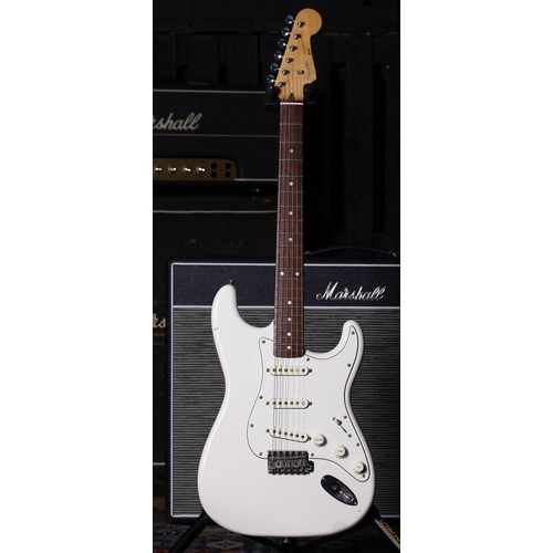 718 - Squier by Fender Stratocaster electric guitar, made in Japan (1993-1994); Body: Olympic white finish... 