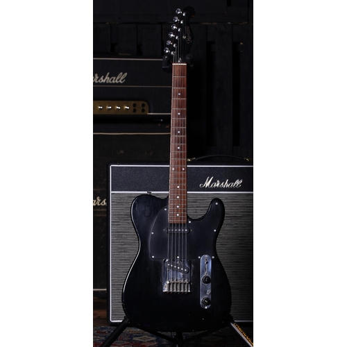 725 - 1985 Hurricane by Morris T Type electric guitar; Body: black finish with dings and wear throughout; ... 