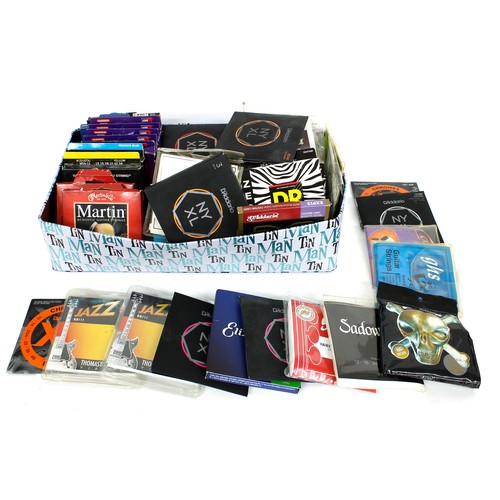 1290 - Good selection of guitar strings to include Thomastik, D'Addario, Elixir, Martin etc... 