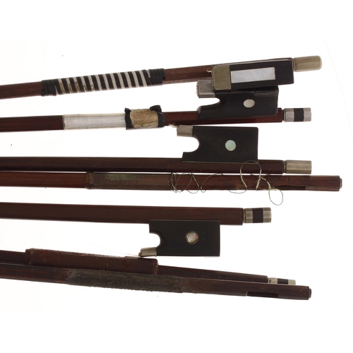 2202 - Four old nickel mounted violin bows and three violin bow sticks (7)