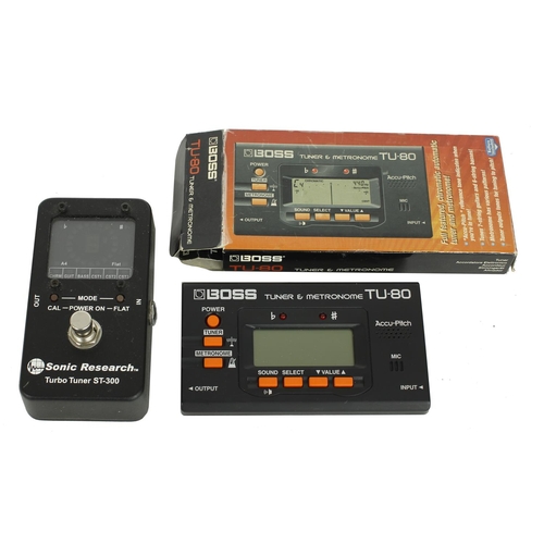 1137 - Sonic Research ST-300 Turbo guitar tuner; together with a Boss TU-80 tuner and metronome, boxed (2)*... 