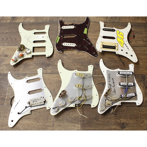 1323 - Five Strat scratchplates, some fitted with an assortment of electronics including a set of Tone Ride... 