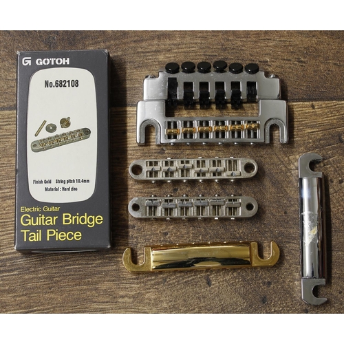 1349 - Three Gotoh Tune-o-Matic type guitar bridges (one boxed); together with a Gotoh stop bar, a further ... 