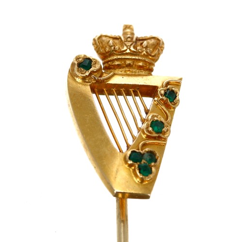 334 - Irish yellow gold harp design stick pin, set with small emeralds, 6.3gm, 88mm long