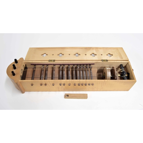 1704 - Symphonie (medieval hurdy-gurdy) by Bernard Ellis, 1977, unlabelled, the case of maple, the lid pier... 