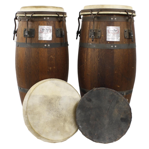 1613 - Two Conga drums bearing a maker's metal plaque inscribed Gon Bops Calif. Inc., Mariano, ser. no. CIT... 