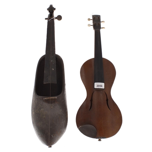 2059 - Eccentric Violinda flatback cornerless violin, with ebonised back and sides and spruce table, 20 1/2... 