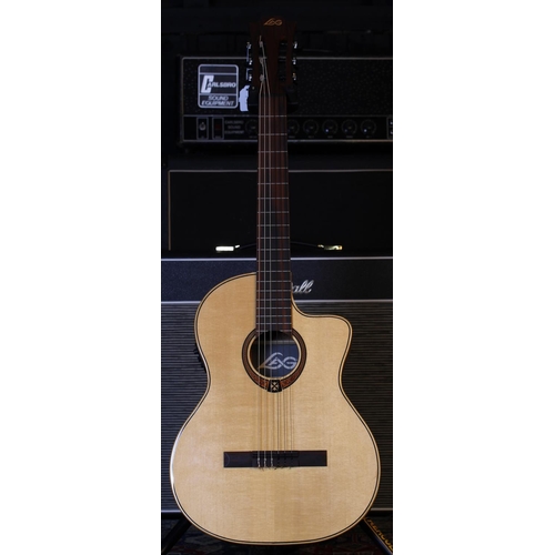 755 - Lag Occitania OC88CE electro-acoustic nylon string guitar; Back and sides: Khaya, lacquer dings and ... 