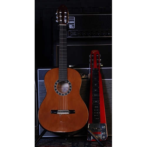 779 - Revelation lap guitar, candy apple red finish; together with a Valencia CG1K/NA classical guitar, so... 