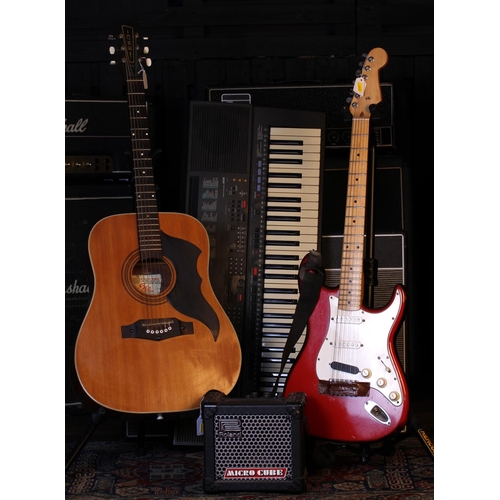 758 - Eko Ranger 6 acoustic guitar; together with an unbranded S type electric guitar, a Roland Micro Cube... 