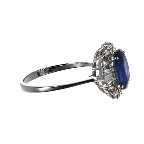 10 - Good certificated 18ct white gold ring, set with an oval-cut sapphire surrounded by round brilliant ... 