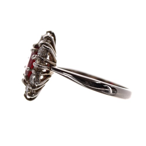 20 - Impressive 18ct white gold ruby and diamond oval cluster ring, the ruby 1.53ct, round brilliant-cut ... 