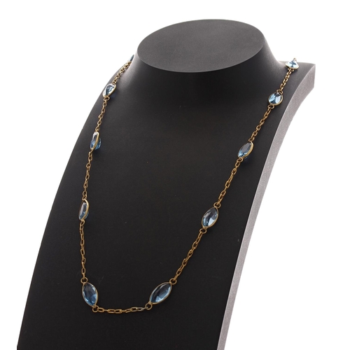 26 - Attractive long 14ct yellow gold blue topaz necklace, set with twenty-four marquise topaz, 36