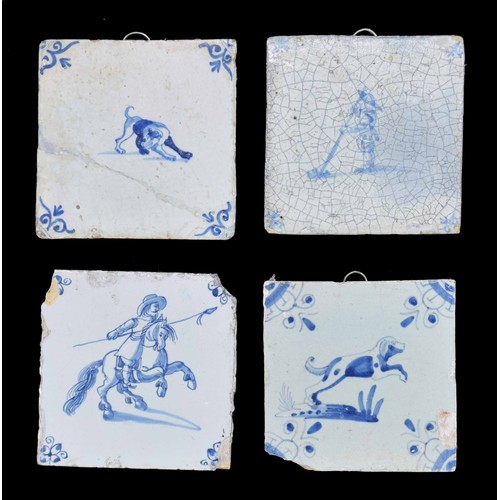 78 - Group of four Dutch Delft pottery tiles, decorated in blue on white with dogs, soldier on horseback ... 