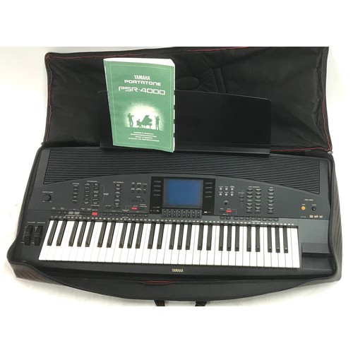 3202 - Yamaha Portatone PSR-4000 keyboard, with owners manual, spare floppy cards and carry-case*Please not... 