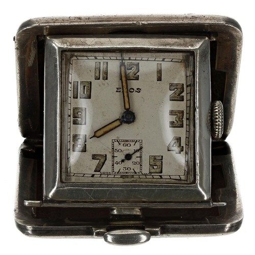 628 - Eros square silver travel purse watch, import hallmarks London 1935, the folding engine turned and e... 