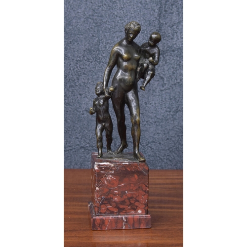 64 - Bronze figural group, after the antique -  a maiden carrying a child, with another child by her side... 