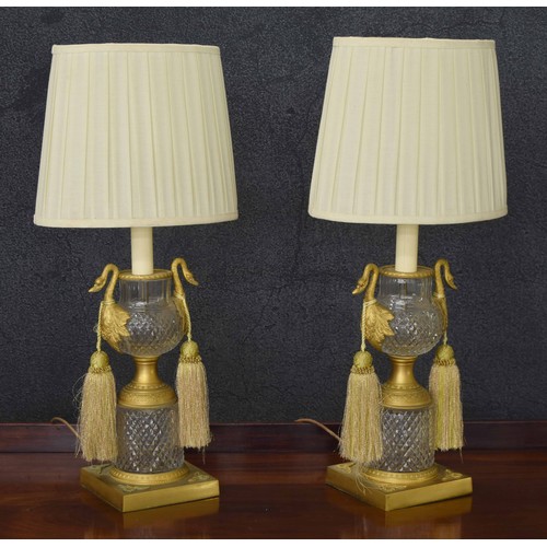 Good pair of French Empire style ormolu and cut glass table lamps, with swan neck handles, 18.5" high including bulb fittings, 24" overall including the shades (2)