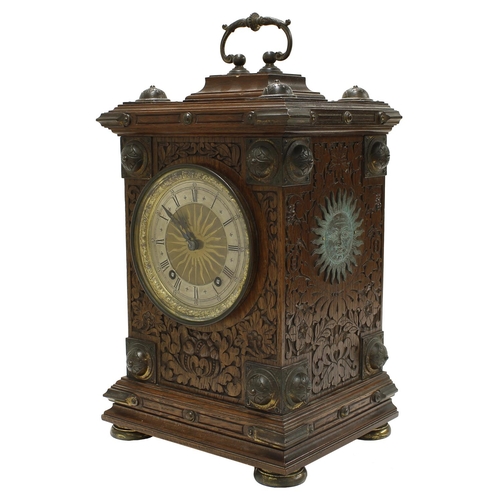 1502 - German gothic oak ting-tang mantel clock, the W & H movement striking on two gongs, the 4.75