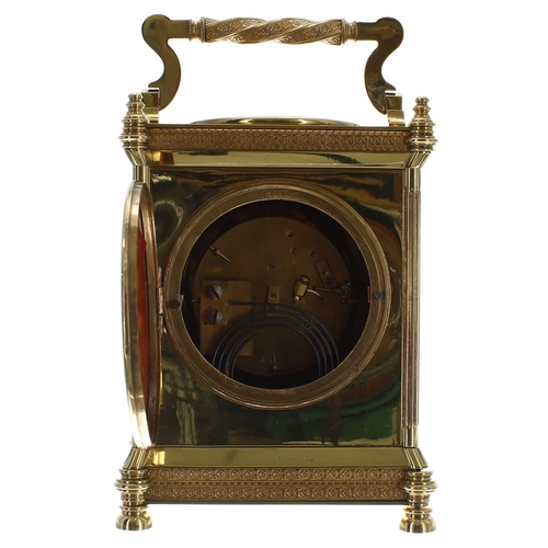 1304 - Brass two train mantel clock with barometer, striking on a gong, the 3.75