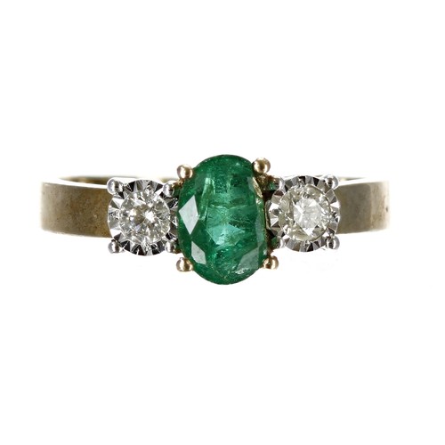 85 - Emerald and diamond three stone 9ct yellow gold ring, the oval emerald 0.50ct approx, flanked by two... 