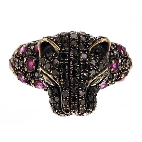 82 - Unusual 18ct yellow gold wild cat design ring, set with rubies and black diamonds, width 15mm, 7gm, ... 