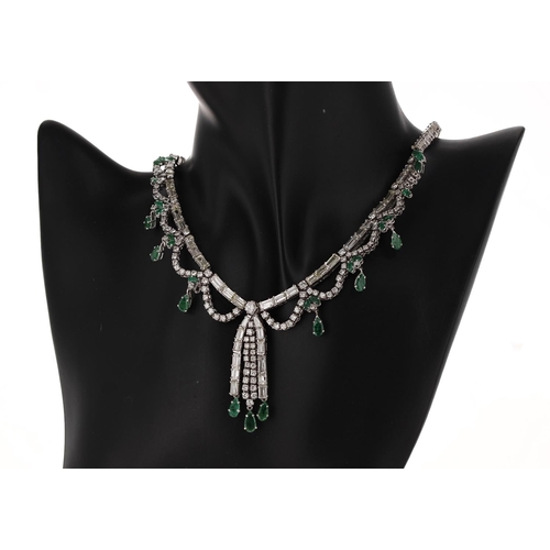 98 - Fine and impressive white gold emerald and diamond fringe necklace, pear shaped and marquise emerald... 