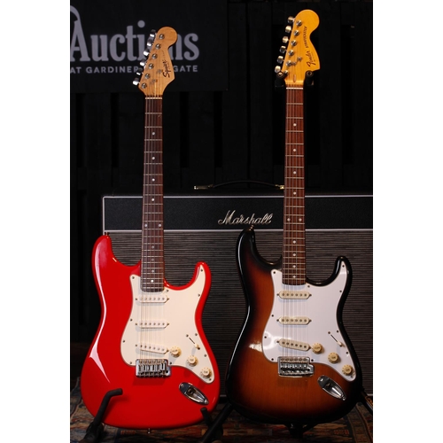 488 - Squier by Fender Strat electric guitar; together with another S-Type electric guitar (2)... 