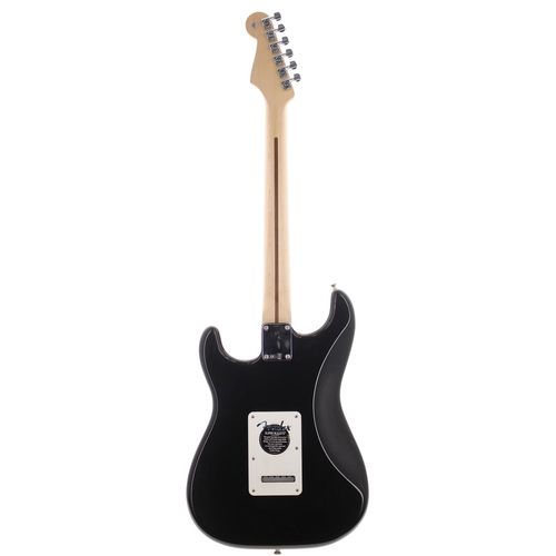 40 - 2006 Fender Standard Stratocaster electric guitar, made in Mexico; Body: black finish; Neck: maple; ... 