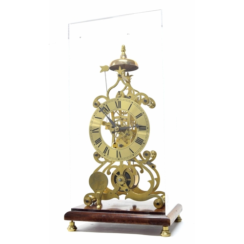 1512 - Modern brass single fusee skeleton clock with passing strike on a bell, the 5.75