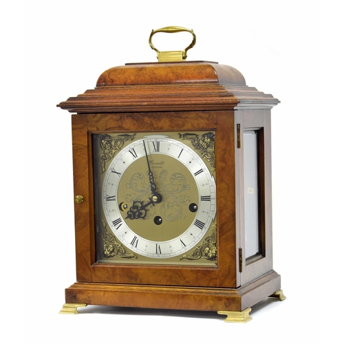 1547 - Modern Comitti of London walnut three train mantel clock, the Kieninger movement striking on eight c... 