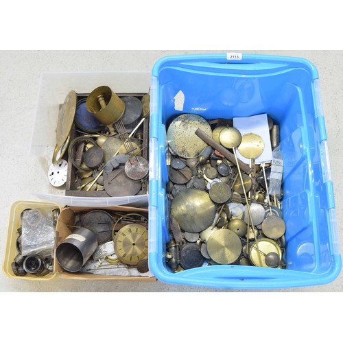 2113 - Very large quantity of various clock pendulums and bobs; also various other clock spares including c... 