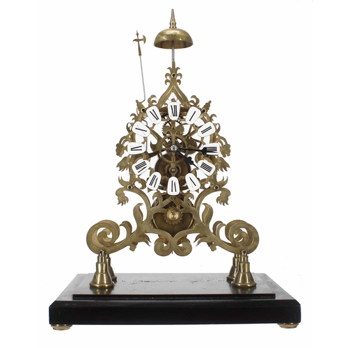 1514 - Brass single fusee skeleton clock with passing strike on a bell, the 6