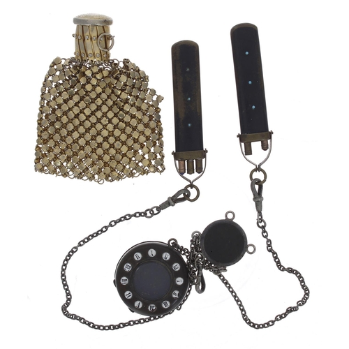 764 - Bakelite style chatelaine with attached fob watch case with applied Roman numerals and two propellin... 