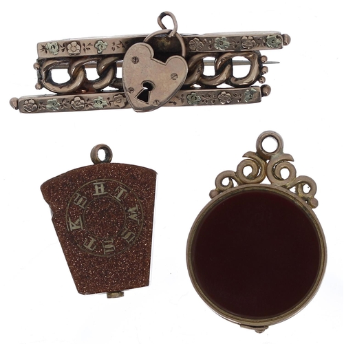 765 - 9ct mounted bloodstone and carnelian fob, 7.2gm; together with a 9ct brooch fob, 3.1gm and a further... 